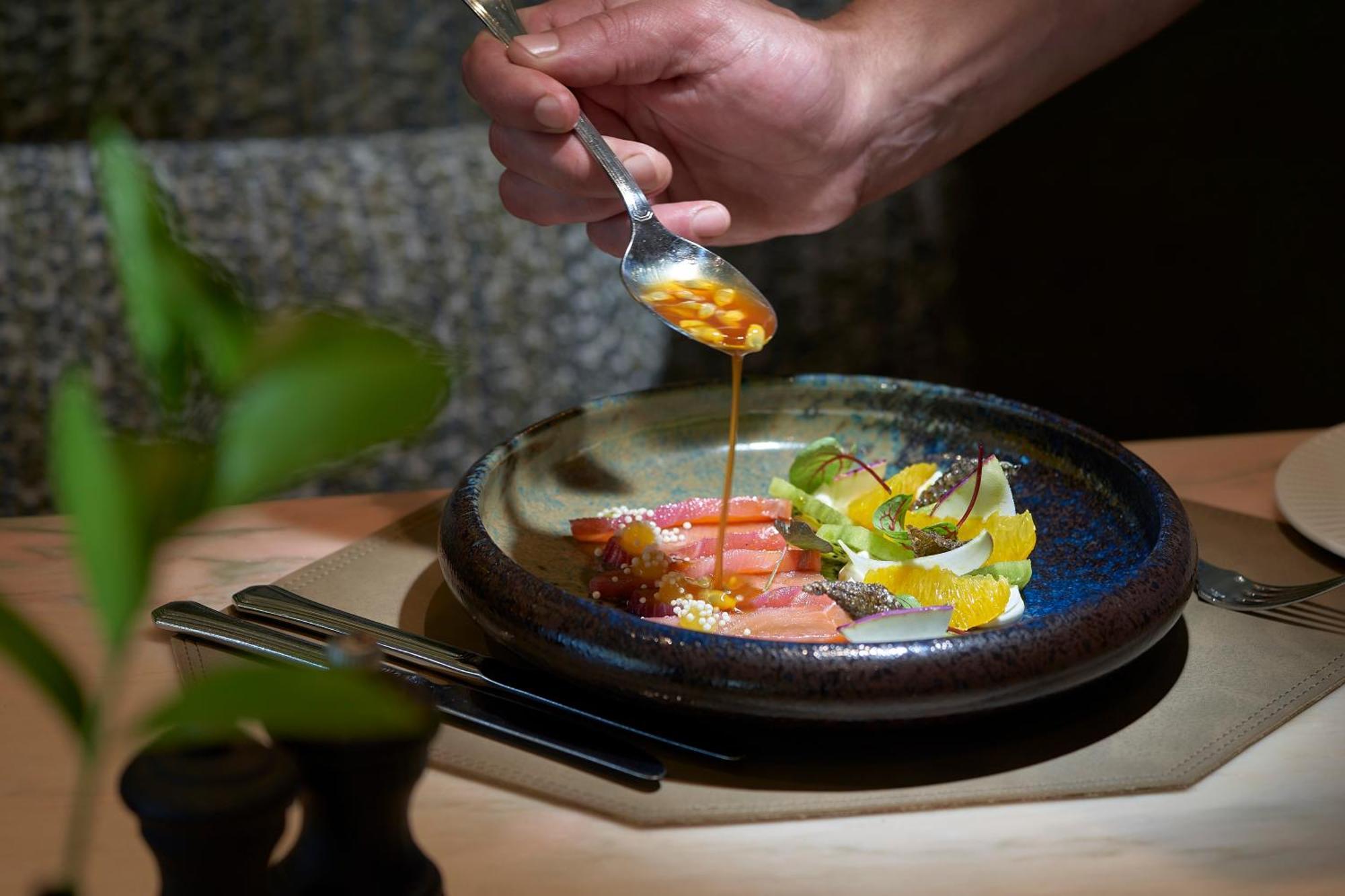 The Cliff Bay - Portobay Hotel Фуншал Екстериор снимка Chef preparing a dish at the restaurant